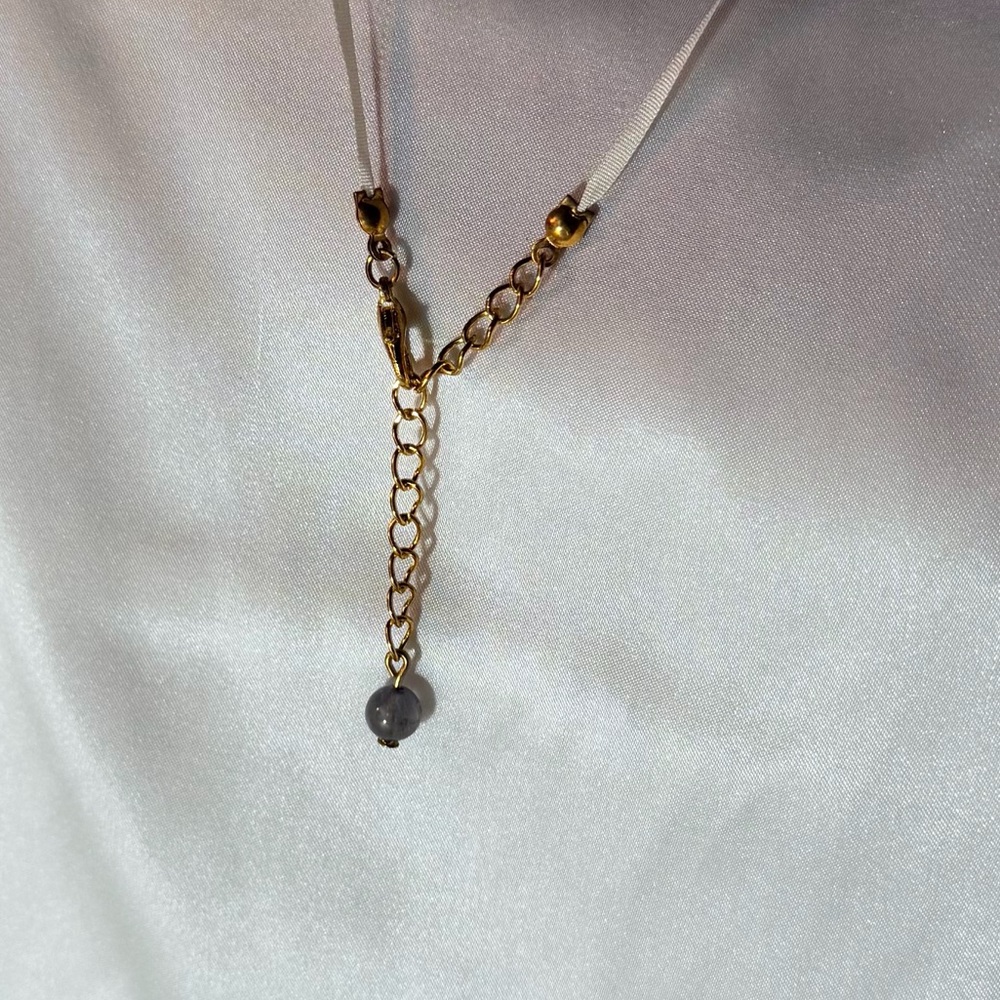 Elegant necklace made with an Iolite bead